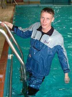 pool lifeguard swimming in uniform clothes